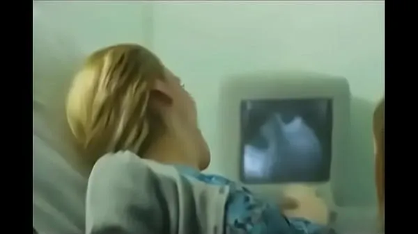 Mostrar Doctor aprovechándose del paciente películas frescas