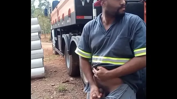 Pokaż Worker Masturbating on Construction Site Hidden Behind the Company Trucknowe filmy
